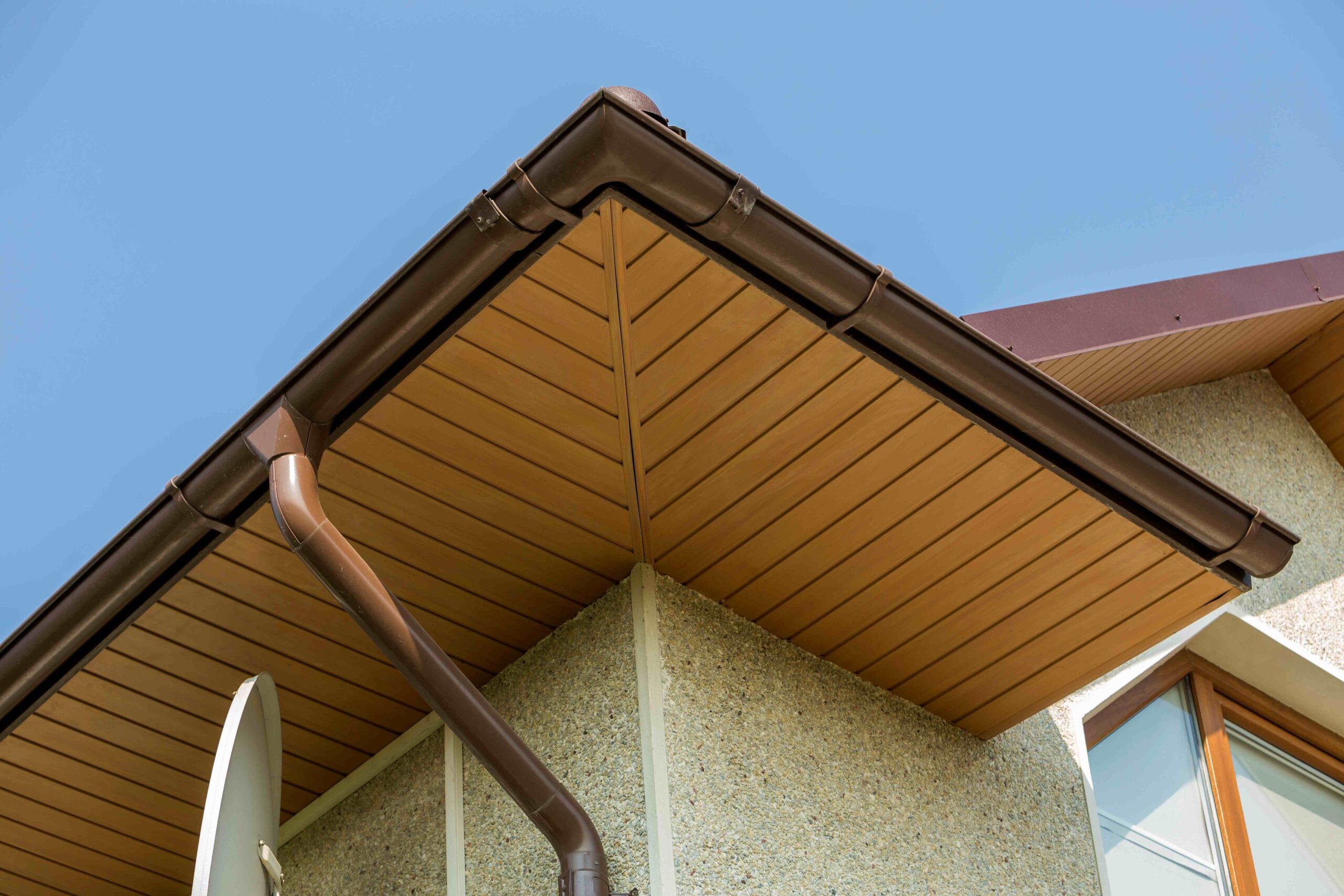 roof-with-gutters-on-building-against-blue-sky-2026-09-22-23-27-14-utc