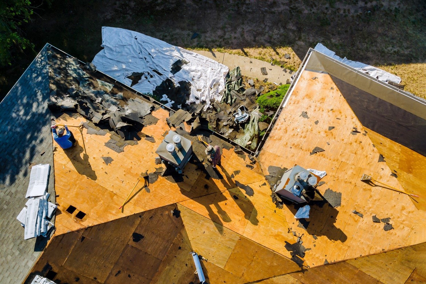 workers-replacing-shingles-on-rooftop-of-a-house-2026-09-22-03-39-53-utc (Large) workers-replacing-shingles-on-rooftop-of-a-house-2026-09-22-03-39-53-utc (Large)